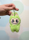 Green Fuzzy Character Plush Keyring – Soft & Cute Charm